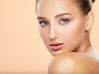 Beautiful face of young caucasian woman with perfect health fresh skin