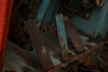 part of the old rusty dozer has been stalled for several years