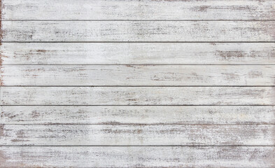 Obraz na płótnie Canvas Old white wooden planks have cracks and scrapes wiht copy space for your text or image.
