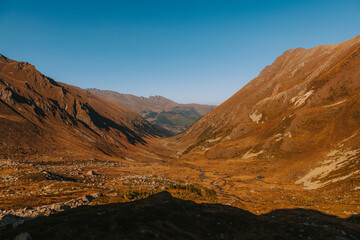 Fototapeta na wymiar Autumn in mountain. Valley in Caucasus mountain.