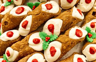Assortment of Sicilian Cannoli with ricotta cheese. Cannolo Siciliano, symbol of Sicily. Traditional italian dessert 

