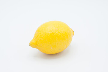 Whole lemon isolated on white background, clipping path, full depth of field