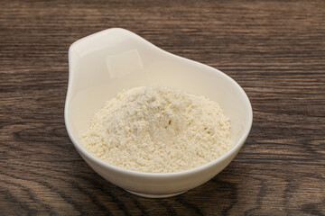 Wheat flour heap in the bowl