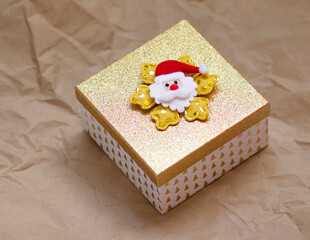 one golden gift on paper