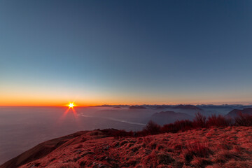 Winter sunset from an alpine peak of Friuli-Venezia Giulia
