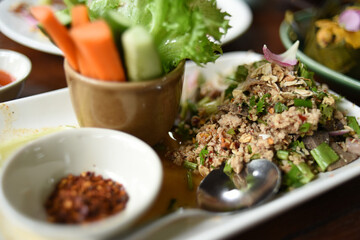 Close up view of spicy minced pork salad (Larb Moo)