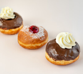 Close up of fresh donuts  for Hanukkah celebration. Selective focus.