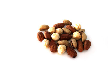 Mixed nuts and dry fruits, white background