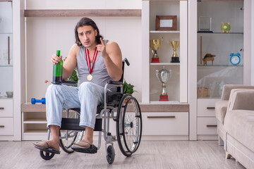Man ex-champion in wheel-chair suffering from alcoholism