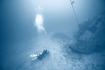 shipwreck diving landscape under water, old ship at the bottom, treasure hunt