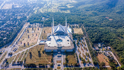 Aerial view of Shah Faisal mosque is the masjid in Islamabad, Pakistan. Located on the foothills of Margalla Hills. The largest mosque design of Islamic architecture
