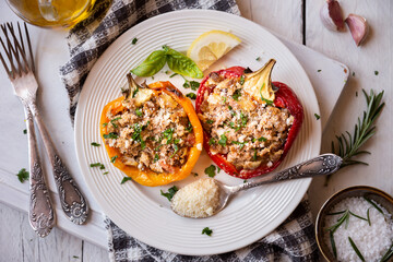 Halves of bell pepper stuffed with meat and vegetables