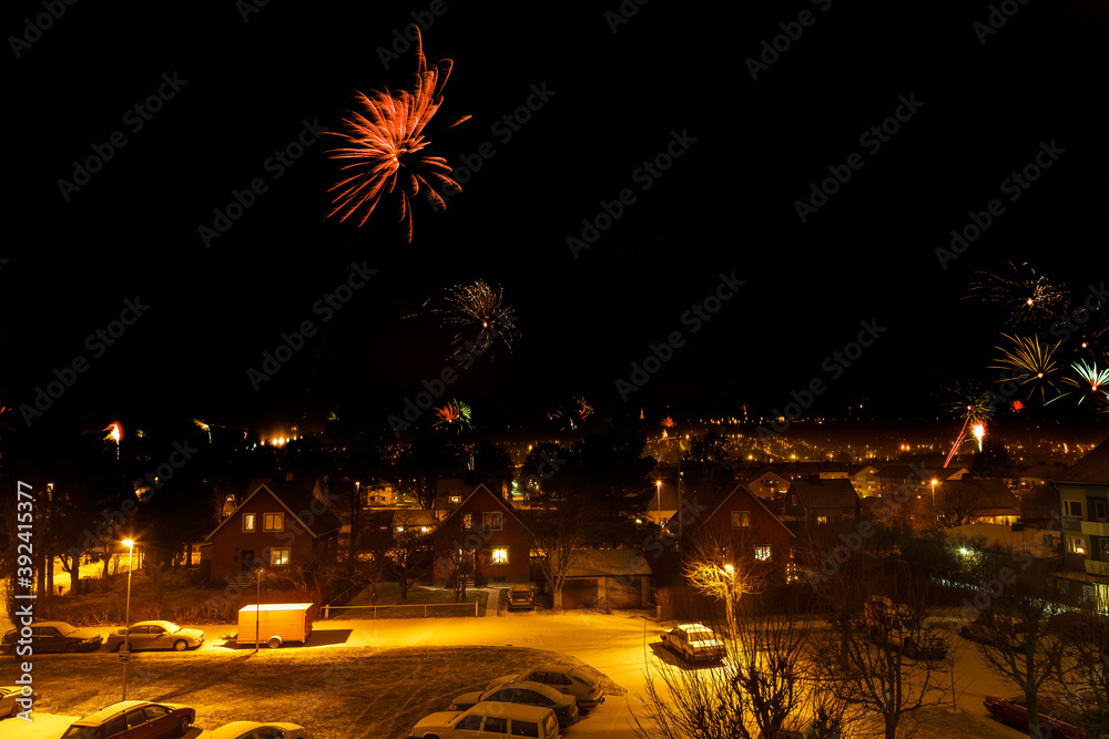 Canvas Prints Cityscape view with fireworks in the sky