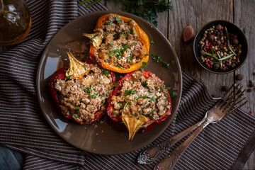 Halves of bell pepper stuffed with meat and vegetables
