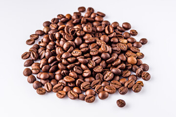 aromatic fresh coffee beans on a white acrylic background
