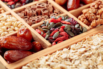 Ingredients for making muesli. Dried fruits, various nuts and seeds.