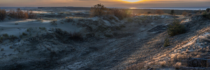 panoramic nature landscape of the Curonian Spit, sunset over endless dunes