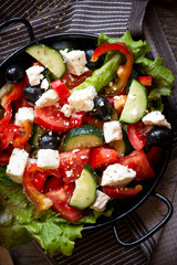 Greek salad with vegetables and feta cheese, healthy vegetable meal