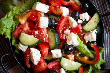 Greek salad with vegetables and feta cheese, healthy vegetable meal