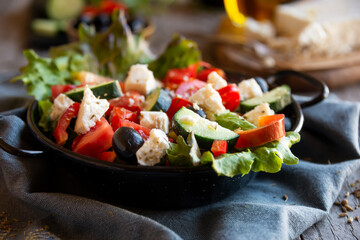 Greek salad with vegetables and feta cheese, healthy vegetable meal