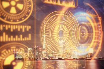 Double exposure of technology theme hologram and cityscape background. Concept of Hightech.