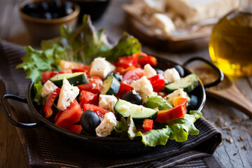 Greek salad with vegetables and feta cheese, healthy vegetable meal
