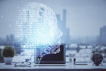 Double exposure of desktop with computer and brain drawing hologram. Artificial intelligence...