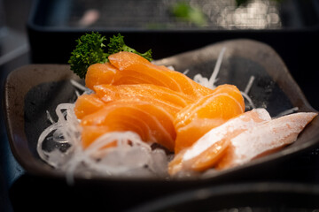 Salmon sashimi cutting fresh and raw piece.
