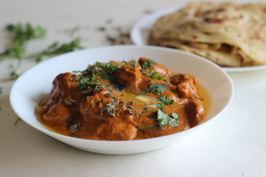 Homemade Malabar parotta with butter chicken