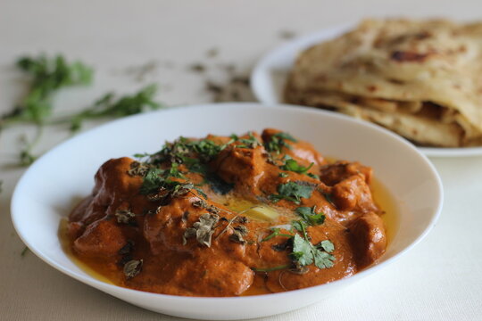 Homemade Malabar parotta with butter chicken
