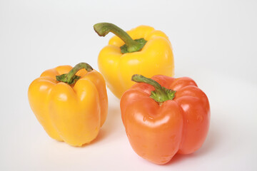 Close-up of fresh, juicy bell pepper on a white background