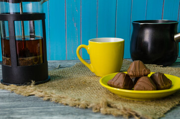 Still life with coffee beans on the wooden background