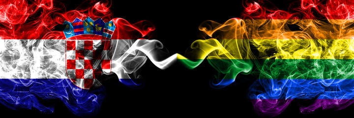 Croatia, Croatian vs Gay, Pride smoky mystic flags placed side by side. Thick colored silky abstract smoke flags.