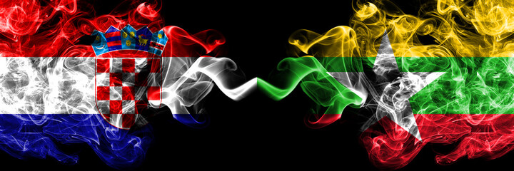 Croatia, Croatian vs Myanmar, Burmese smoky mystic flags placed side by side. Thick colored silky...