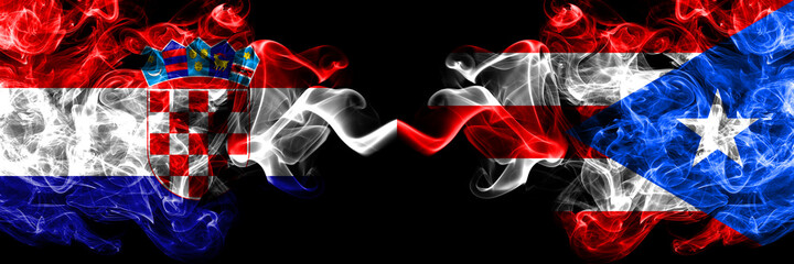 Croatia, Croatian vs Puerto Rico smoky mystic flags placed side by side. Thick colored silky abstract smoke flags.