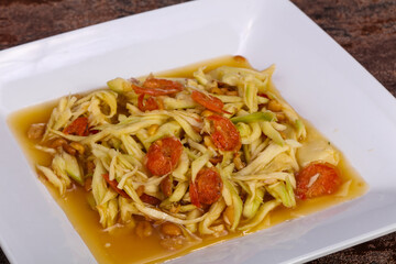 Green mango salad with seafood