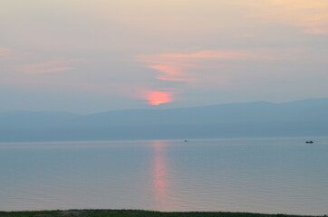 Obraz na płótnie Canvas Sunset over the lake of Baikal