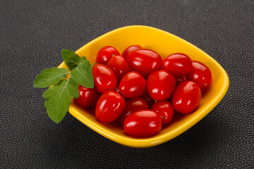 Red cherry tomatoes in the bowl