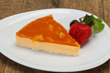 Cheesecake with apricot served strawberry
