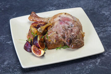 Roasted. duck. leg with plum and apple