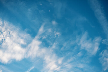 Blue sky with fluffy clouds, abstract natural background texture