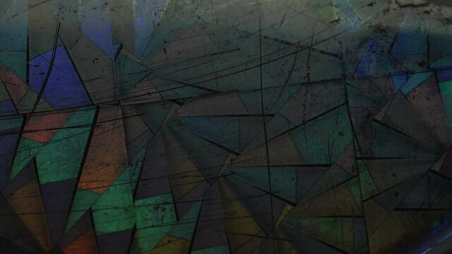 real shiny led light moving over silver rainbow holo foil, glitter dust background loop, cool dark music video transition or overlay. Scratched holographic plastic surface in 4k.