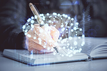 Multi exposure of woman's writing hand on background with brain hologram. Concept of brainstorming.