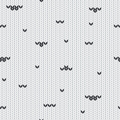Knitted white seamless pattern with black strokes. Black and white