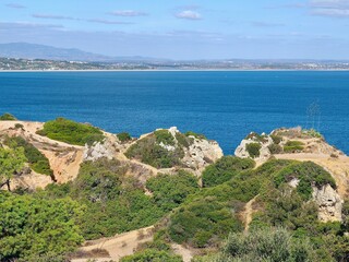 The beauty of Portugal - hiking in Lagos at the blue Atlantic ocean in Portugal