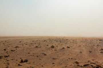 Sandstorm in rocky desert terrain. Erg Chigaga، Morocco