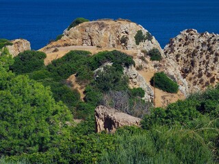 The beauty of Portugal - hiking in Lagos at the blue Atlantic ocean in Portugal