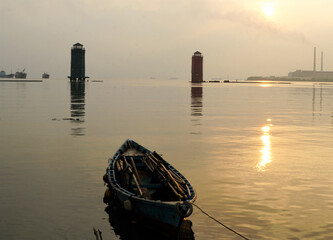 Fisherman traditional wooden boats captured at the coastal areas after sunrise.
