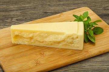 Hard parmesan cheese served basil