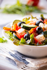 Greek salad with vegetables and feta cheese, healthy vegetable meal